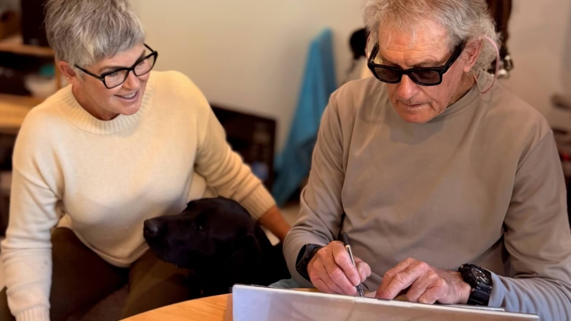 Assisting older man to fill out forms